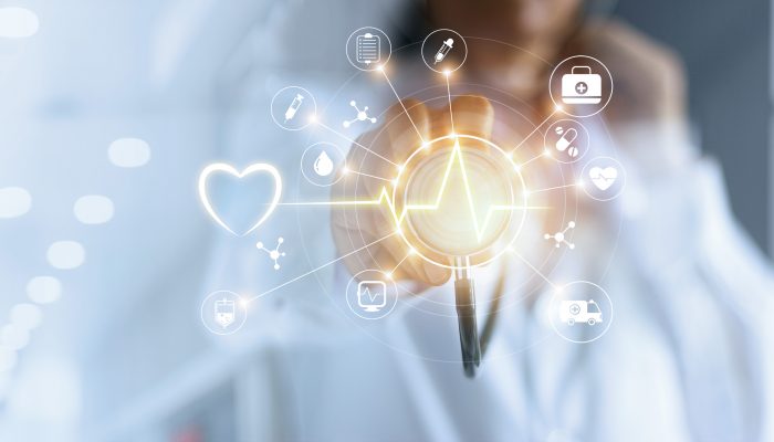 Medicine doctor and stethoscope in hand touching icon medical network connection with modern virtual screen interface, medical technology network concept